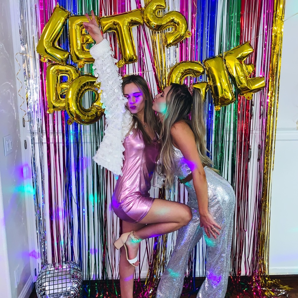 Sequin jumpsuit flare bottom halter neck